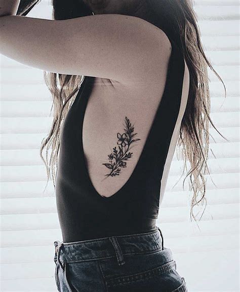 rib tattoos gallery|beautiful rib tattoos for women.